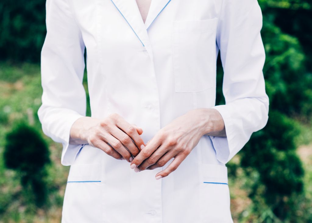 cropped-view-of-doctor-in-white-coat-standing-in-p-2026-01-05-23-42-39-utc (1)